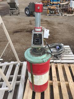 Q Sine Pneumatic Grease Gun Filling Machine with 30 L Drum of Grease 3/4 Full.