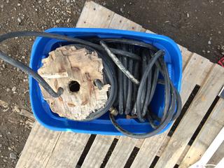 Blue Tote Containing Roll of Royal Electric 12/3 Type S Wire.