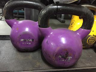 (2) 24kg Kettle Bells.