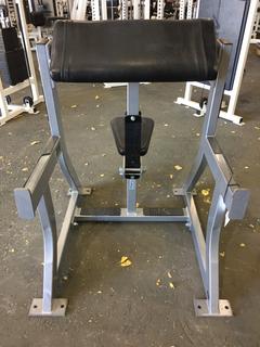 Hammer Strength Seated Arm Curl.
