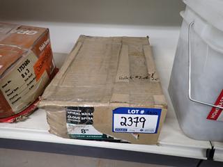 50lb Container of 8" Exterior Galvanized Spiral Nails.