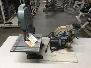 Delta Universal Wet/Dry Grinder, Model # 23-700C & Delta Ban Saw with 2.5 Amp Motor. *Both Mounted on Plywood Base*.