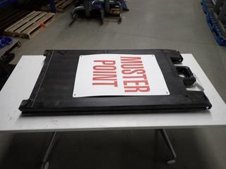 Pop Up Muster Point Sign and Small Metal Shelf.