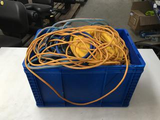 Blue Crate Containing Castors, wheels and Extension Cords.