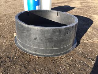 Black Plastic Stock Tank 5' Diameter 2' Deep with Drain. *Damaged*.