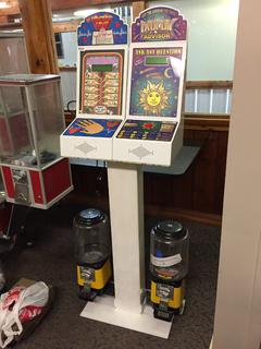 Dual-Sided Fortune Teller & Love Tester Machine w/ (2) Northern Beaver Candy Machines. Approximately 61"H x 23 1/2"L. *Note: Keys For This Machine Are In Office