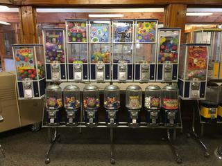 Northern Beaver Toy & Gumball Machines. Approximately 88 1/2"L x 67"H. *Note: Keys For This Machine Are In Office