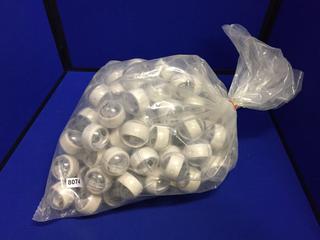 Assorted Toys In capsules (Toy Story, Yoyo's, etc.) & Poly-Clean Hockey Tape In Capsules.