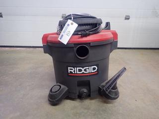 Ridgid Model 1200RVO 10A 120V 12-Gal Wet/Dry Shop Vac. SN 18032R070076
