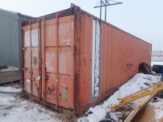 Genstar 40ft Storage Container. *Note: Contents Not Included, Holes In Door, Buyer Responsible For Loadout*