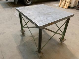 Rolling Steel Table, 44"x 36"x 35".