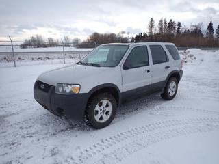 2006 Ford Escape 4X4 XLT c/w 3.0L V6, A/T, A/C, Showing 251,857 Kms, 235/70R16 Tires, VIN 1FMYU93196KB45126 *Note: Major Damage, Carfax in Documents Tab*