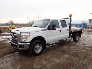 2015 Ford F-350 Super Duty XLT Crew Cab 4X4 Flat Deck c/w A/T, A/C, Showing 110,584 Kms, Manual Hub, Beacons, Headache Rack, Storage Cabinet, LT275/70R18 Tires at 80%, Rears at 60%, 8 Ft 6 In. Box, VIN 1FT8W3B69FEB46705 *Note: Check Rear Park Aid Message, Left Signal Stays On, Boost to Start*