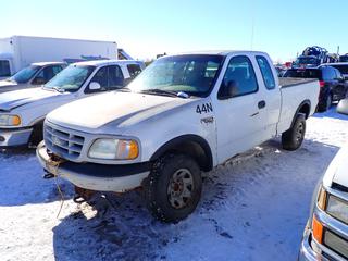 1999 Ford F-250 Extended Cab 4X4 Pick Up c/w 235/75R15 Tires, 6 Ft. 6 In. Box, VIN 2FTPX28L0XCB05032 *Note: Parts Only, No Steering, Dash Parts Missing* **Located Offsite at 21220-107 Avenue NW, Edmonton, For More Information Contact Richard at 780-222-8309**