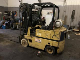 Selling Off-Site - Cat T40D 4,000 LB Forklift c/w LPG, 3 Stage Mast, S/N 8EB12133. Located at 5717 - 84 Street SE Calgary, AB Call Johnnie @ 403-990-3978 For Further Information and Viewing.