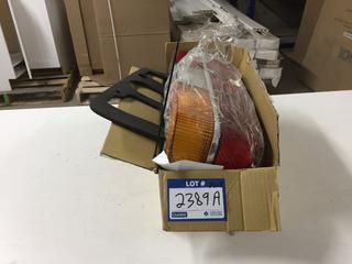 URO Parts Tail Light Assembly, Part # URO-007009. *Damaged*