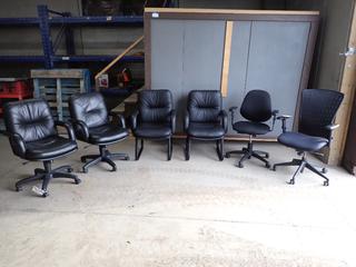 (4) Office Chairs w/ Castors & (2) Arm Chairs.