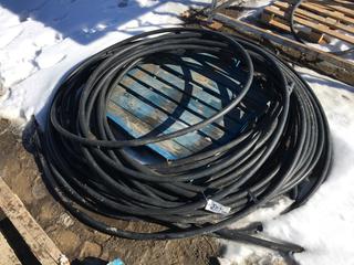 Rolls of Black 1 3/8" Water Pipe, Total Length Unknown.