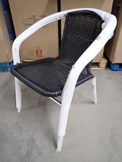 (4) Brown Resin Wicker Outdoor Chairs.