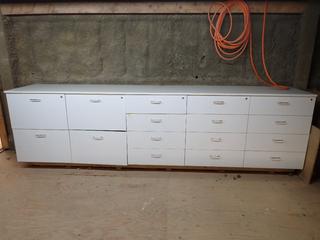 16 Drawer Cabinet 128" x 24" x 32 3/4" c/w Assorted Wood Samples. *1 Drawer Face Needs Repair*