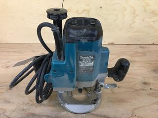 Makita Model 3612C 120V Plunge Router.