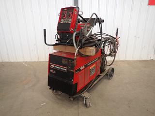 Lincoln Electric Power Wave 455M/STT 208/230/460/575V 3-Phase Multi-Process Welder, SN 1061003705 C/w Lincoln Electric Power Feed 10M Wire Feeder, K857-1 Speed Controller, Magnum 400 MIG Gun, Cable And Cart. SN U1060304086