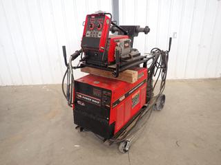 Lincoln Electric Power Wave 455M/STT 208/230/460/575V 3-Phase Multi-Process Welder, SN U1050917363 C/w Lincoln Electric Power Feed 10M Wire Feeder, K857-1 Speed Controller, Magnum 200 MIG Gun, Cart, Cable And Unused Tips And Diffuser. SN U1060615344