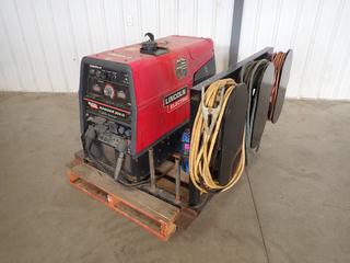 2008 Lincoln Electric Ranger 305G 120/220V Single Phase Welder C/w Kohler CH23S Gas Engine, Steel Rack, Ground And Welding Cable. Showing 2980hrs. SN U1080413101