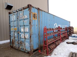 1998 40ft 9ft6in(H) Storage Container C/w Wood Shelving. SN HJCU-9005053 *Note: Contents Inside And Around Container Not Included, *Note: Buyer Responsible For Loadout. Call Graham prior to pickup 403-968-7697