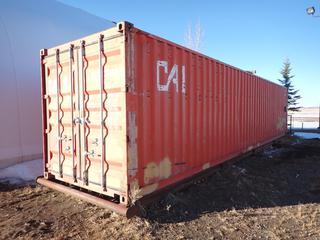 1999 40ft Skid Mtd. Storage Container C/w 45ft Skid Length, 5ft Back Storage Platform, Wood Cabinets, Table, Storage Shelves And Hanging Hooks. SN CAXV7069168 *Note: Buyer Responsible For Loadout*