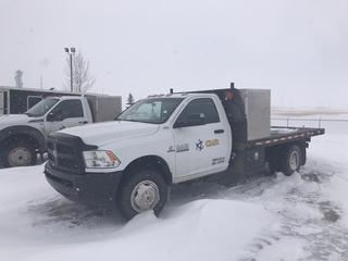 2014 Dodge Ram 3500 4X4 Flat Deck Truck C/w 6.7L Cummins Turbo Diesel, A/T, 12ft X 8ft Wood Deck,  2 5/16 Ball Hitch, Prodigy P2 Brake Control Trailer Brake, (2) 36in X 28in X 40in And (1) 24in X 36in X 18in Aluminum Storage Boxes, (2) 24in X 18in X 18in Storage Boxes, (2) 28in X 24in X 20in 4-Drawer Aluminum Toolboxes, Pipe Rack, Beacon Light, LT235/80 R17 Tires And Spare Tire. Showing 128,118kms. VIN 3C7WRTBL7EG156289 