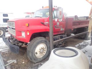 1989 Ford F800 4X2 S/A Dump Truck C/w 7.8 L L6 Turbo Diesel, A/T w/ Hi/Lo, Tekonsha Voyager Brake Controller, 33,000lb GVWR, Enerpac Spreader Control Box, Spring Suspension And 11R22.5 Tires. Showing 8614hrs, 203,293kms. VIN 1FDXK84A7KVA14800 *Note: Running Condition Unknown, Windshield Damaged*