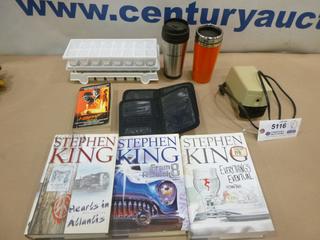 Qty of Stephen King Hard Cover Books, Insulated Travel Mugs, Electric Pencil Sharpener, Passport Holders, Household Items and More (F-1)