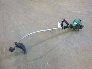 Gas Powered  Feathe Lite  Weed Wacker (F Wall)