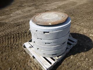 (7) Concrete Spacer Rings, (1) Man Hole Cover