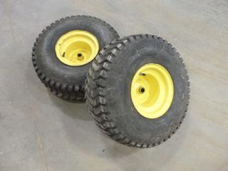 (2) Titan Super Tuff 20x10.00-8 Tires and Rims for John Deere Mower