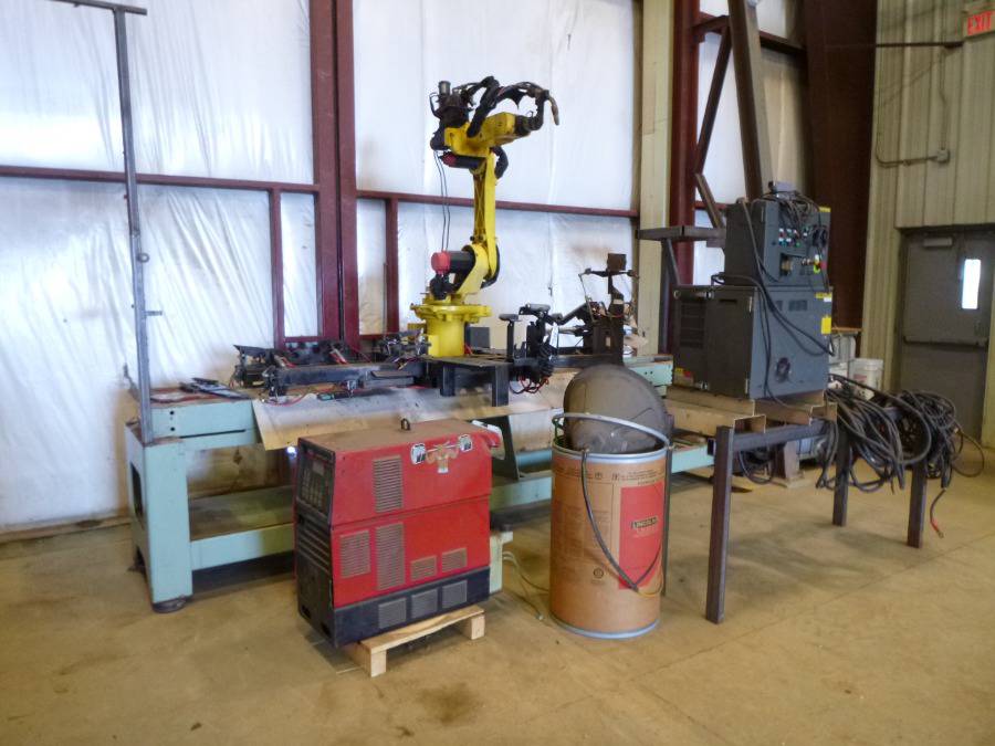 1997 Fanuc Arc Mate 100i Robotic Arm Welder c/w Fanuc R-J2 Power System, 575V, 3 Phase, Lincoln Power Wave 450, SN U1990922223 (Damaged), (2) Controllers, Lincoln Synergic 7F Semiautomatic Wire Feeder, Manual, Mounted on 13 Ft. 8 In. x 32 In. Table, SN E97404673 *Note: Runs as per Consignor* *Manual in Office*