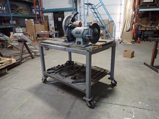 **Located Offsite @ Scott Can- 9523 49 Ave NW, Edmonton** 57in X 37in X 40in Portable Steel Work Bench C/w Ridgid Model 614 115V 14in Dry Cut Saw And Delta 120V 10in Bench Grinder  *Note: No Equipment On-Site, Buyer Responsible For Loadout, For More Information Contact Chris @ 587-340-9961*
