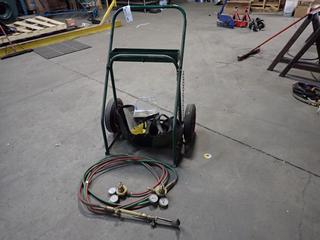 **Located Offsite @ Scott Can- 9523 49 Ave NW, Edmonton** Oxy/Acetylene Cutting Torch Cart C/w Victor Cutting Torch, (2) Gauges, Oxy/Acetylene Hose And Assorted Welding Helmets *Note: No Equipment On-Site, Buyer Responsible For Loadout, For More Information Contact Chris @ 587-340-9961*