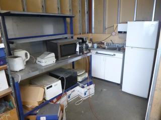 **Located Offsite @ Scott Can- 9523 49 Ave NW, Edmonton** 72in X 30in X 60in Steel Table C/w Fresh Master Fridge/Freezer, Toaster, Kettle And Assorted Kitchen Appliances *Note: Working Condition Unknown, No Equipment On-Site, Buyer Responsible For Loadout, For More Information Contact Chris @ 587-340-9961*