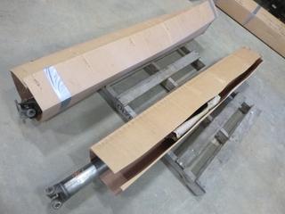 (1) Unused Ford Super Duty 2005-2010 SRW 2 Piece Driveshaft, (1) Unused Ford Super Duty 2006-2010 F-350 -F-550 Rear Driveshaft, 165 In. W/B  (L-5-1)