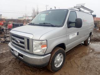 2010 Ford E-250 Van C/w 5.4L Flex Fuel Gas Engine, A/T, Ranger Roof Rack, Galvanized Steel Shelving And LT245/75 R16 Tires. Showing 262,407kms. VIN 1FTNE2EL1ADA93983 *Note: Windshield Damaged, BC Registered*