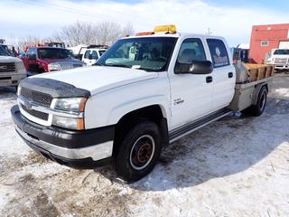 2003 Chevrolet Silverado LT 3500 4X4 Crew Cab Flat Deck Truck C/w Duramax 6.6L Turbo Diesel, A/T, Dually, 8 1/2ft Deck, Wood Side Rails, 80in X 16in X 16in Checkerplate Fuel Storage Tank w/ GPI 12V Fuel Transfer Pump, Hose, Nozzle, (2) 36in X 20in X 14in Checkerplate Storage Boxes, (2) 28in X 14in X 15in Checkerplate Storage Boxes And LT285/85 R16 Tires. Showing 450,341kms. VIN 1GCJK331X3F188578 *Note: Hole In Drivers Seat, Windshield Damaged*