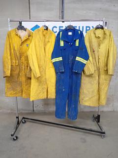 (1) Reflective Flame Resistant Coveralls Size 48, (2) Flame Resistant Rain Coats & (1) Rain Coat. *Note: Rack Not Included*