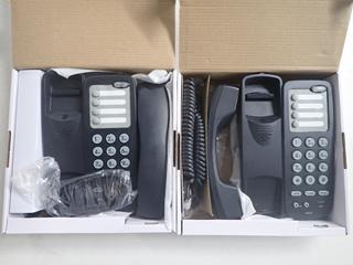 (2) Boxes of NEC Hearing Aid Compatible Telephone Sets.