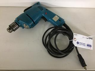 Makita Model 6510LVR 10mm Drill.