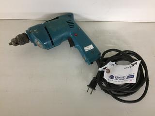 Makita Model 6510LVR 10mm Drill.