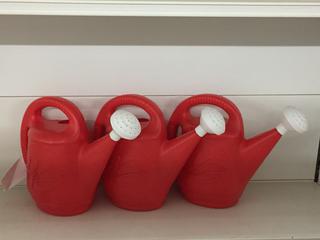 (3) H2O Red Plastic Watering Cans.