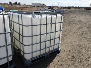 Plastic 275 Gallon Water Tote c/w Metal Frame.