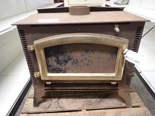Antique Wood Burning Stove. Approximately 30 1/2 In. Length, 19 1/2 In. Width, 29 In. Height.